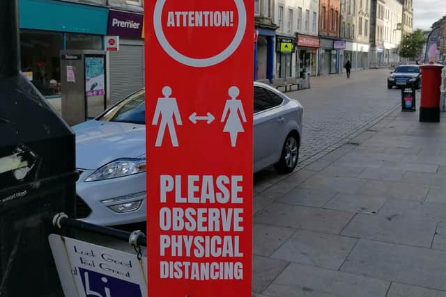 High Street, Kirkcaldy with social distancing signage in place during lockdown