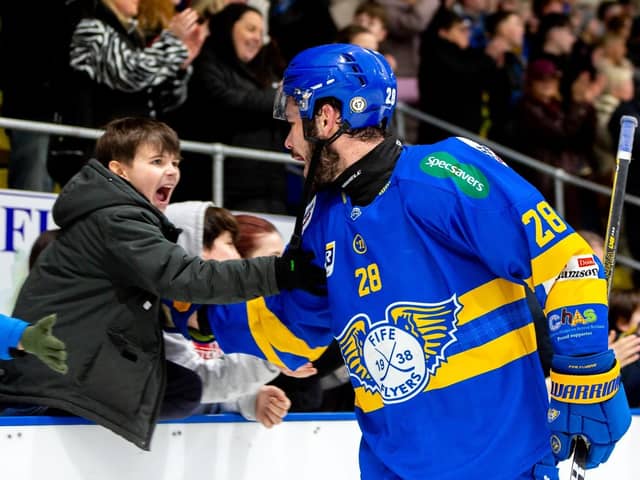 High five from Brady Poteau for this delighted young Fife Flyers fan (Pic: Derek Young)