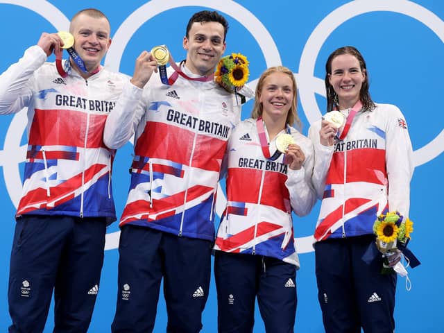 Kathleen Dawson with her triumphant Great Britain team-mates Adam Peaty, James Guy and Anna Hopkin (Pic by Clive Rose/Getty Images)