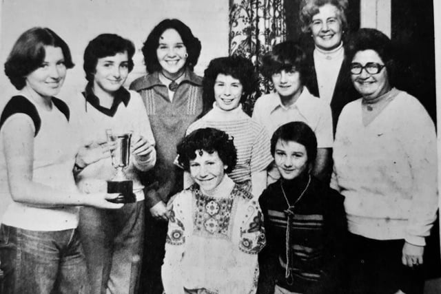 Mrs Maude Miller, wife of the Burntisland Golf House Club captain, donated a new trophy to the club for competition between girls whose parents are club members.,
The Francesa Margaret Trophy was named after her 16-year old daughter.
The first winner, Katie Weir, is pictured receiving the silverware watched by some of the girls who competed.
From left: Frances Miller, Katie Weir, Anne Ferguson,Valerie Wallace, Anne Smith, ladies captain Mrs Mary Wallace, and ladies’ vice-captain Mrs Jan Agnew.
Front Lorna Kingsland and Anne Taylor.