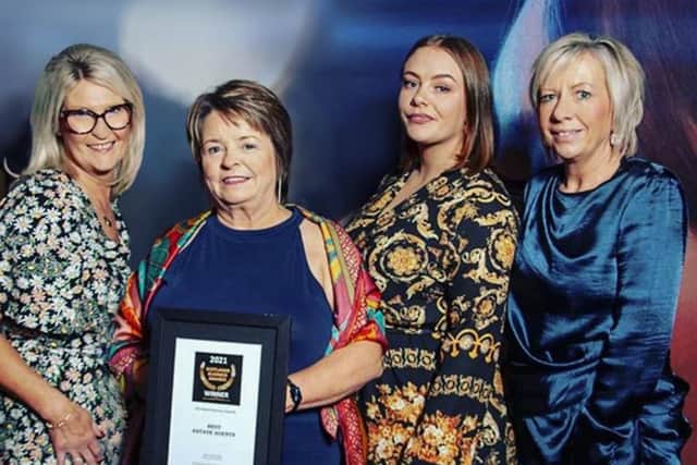 Lawrie Estate Agents owner Joyce Lawrie with staff at the British Property Awards ceremony.