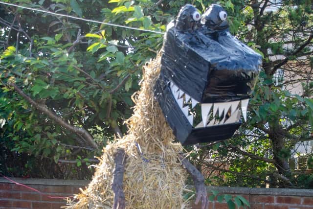 A dinosaur scarecrow from last year's Kinghorn Scarecrow Trail.