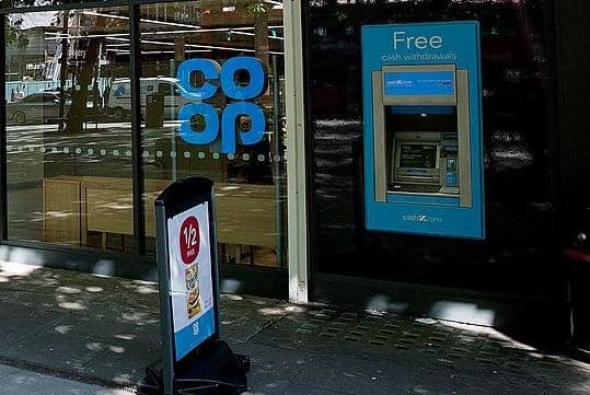 The single town ATM is located at the Co-op but has been out of service for nearly two weeks.
