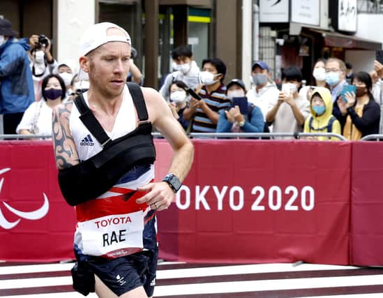 Derek Rae competing in the men's Marathon (Photo by Tasos Katopodis/Getty Images)