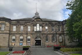 The event was set to be held at the Adam Smith Theatre