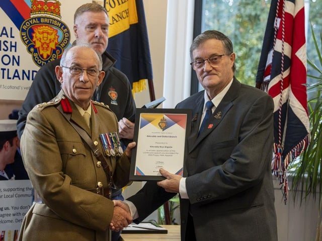 Colonel Jim Kinloch makes a presentation to Kirkcaldy Boys Brigade