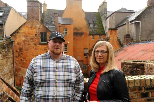 Ricky Barclay - owner of the new Merchants House cafe - with wife Marzena at the back of the property. Pic: Fife Photo Agency