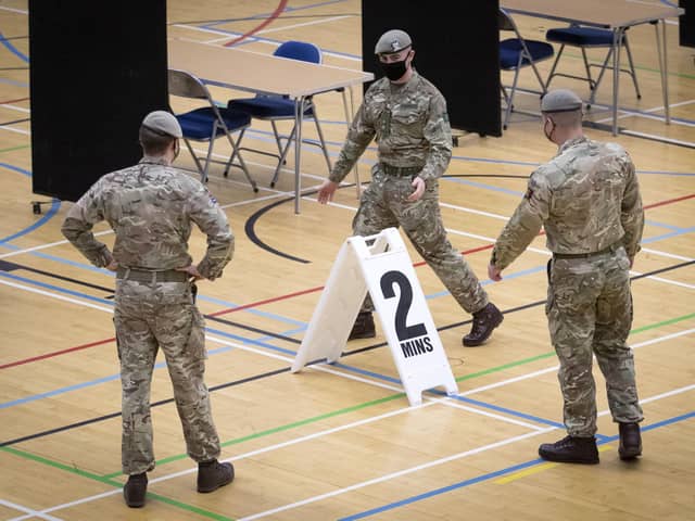 Members of the Royal Scots Dragoon Guard carry out a reconnaissance before setting up a Covidâ€“19 vaccination centre at the Ravenscraig Regional Sports Facility in Motherwell