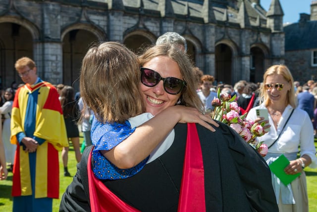 New St Andrews graduates celebrate in the University's historic St Salvator's Quad.