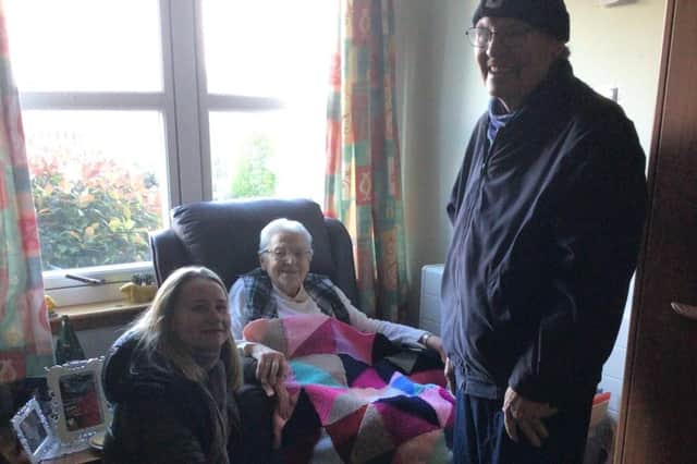 Resident at Camilla home with Fife Carers Centre befriending coordinator Sylwia Nadolny and volunteer Tomas Sime