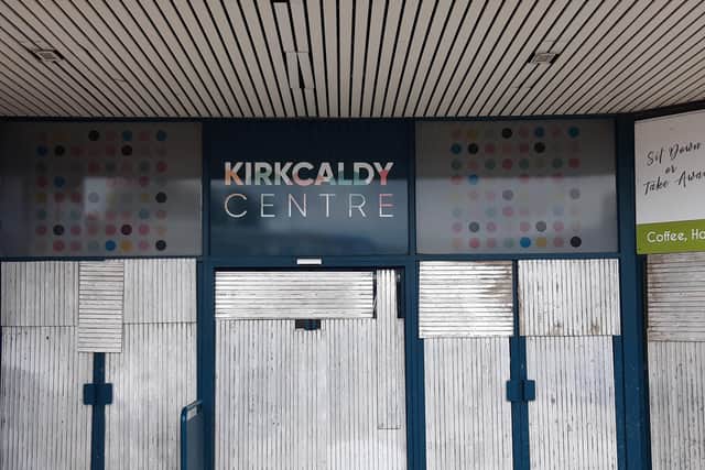 The boarded up entrance to The Postings Shopping Centre, Kirkcaldy
