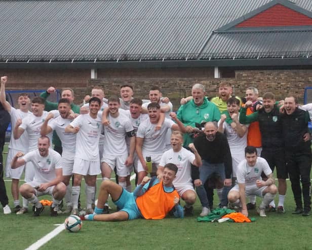 Craig Gilbert and his jubilant Thornton Hibs players celebrating sealing promotion after 2-1 win at Armadale Thistle