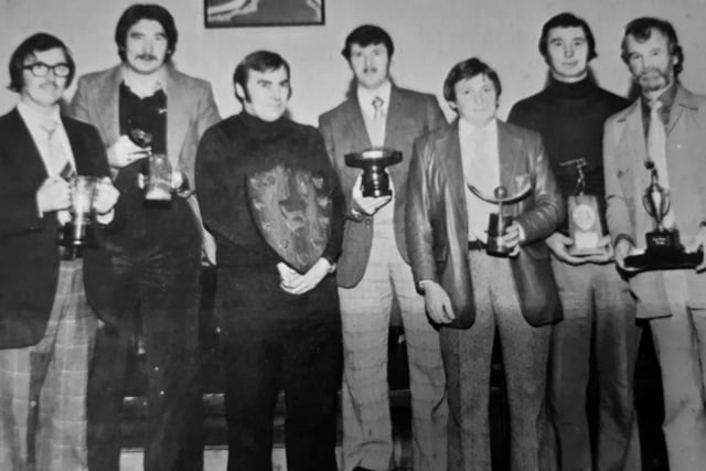 A.H. McIntosh’s golf club section trophy winners for 1977 - J. Oliver, B. Cunningham, J. Craig, J.Wilson, J.Penman, B. Henderson and A. Douglas