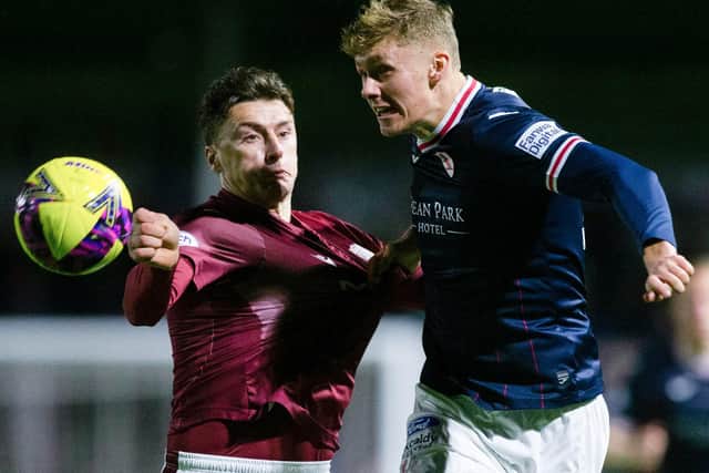 Raith Rovers defender Connor O'Riordan and Arbroath's Michael McKenna vying for the ball at Gayfield Park (Photo by Ewan Bootman/SNS Group)