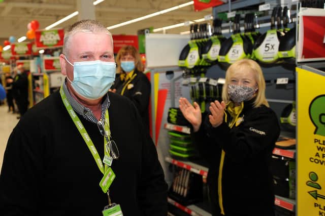 Stephen Gallagher being applauded by an Asda colleague. Pic: Fife Photo Agency.