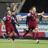 Cupar Hearts scorers Richie Lawson (right) and Cammy Greenhill celebrate goal with Lachlan Murphy in 2-0 semi-final victory over Steins Thistle last Friday