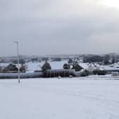 The snowy scene looking across Kirkcaldy