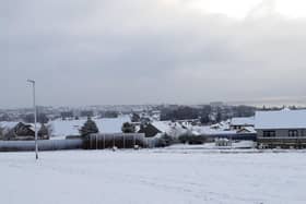 The snowy scene looking across Kirkcaldy