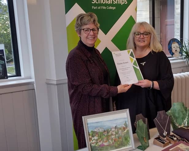 Elaine Green receives her certificate from Yvone Kirkwood of the Friends of Kirkcaldy Galleries.