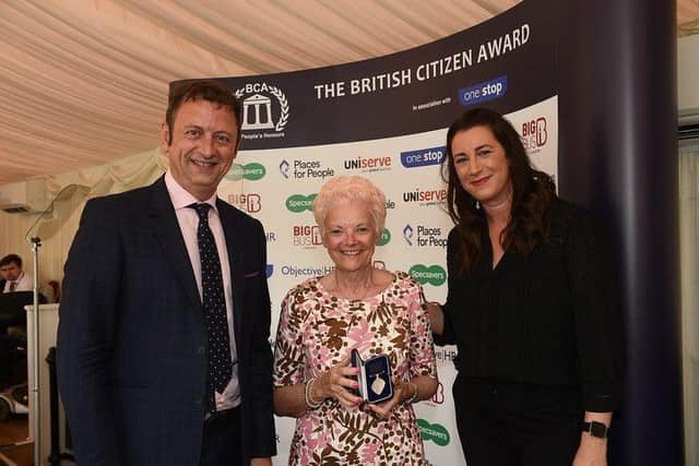 Joyce Nicoll received the British Citizen Award at a recent ceremony in London.  She is pictured with TV presenter Matt Allwright and Stephanie Wood, from BCA partners One Stop.  (Pic: submitted)