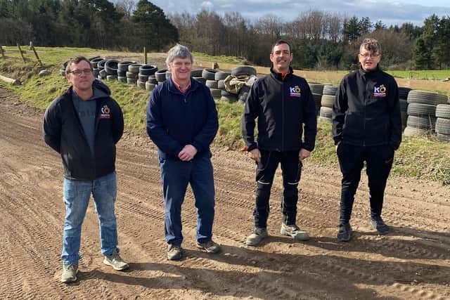 Peter Grant (second from left) with members of Kingdom Off Road Motorcycle Club during his visit.