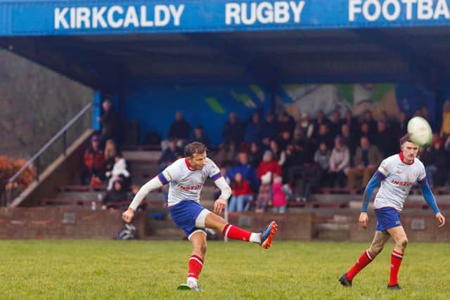 Kirkcaldy's Fin Smith kicks for goal against Gordonians