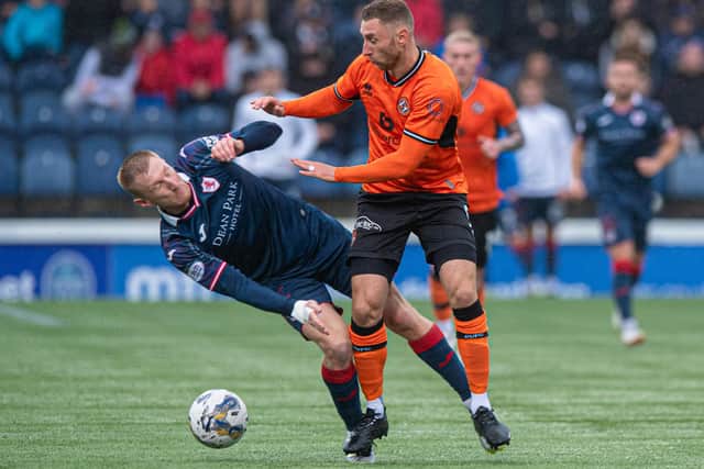 Raith Rovers defender Liam Dick and Dundee United striker Louis Moult in action at Stark's Park in Kirkcaldy on Saturday (Pic: Sammy Turner/SNS Group)