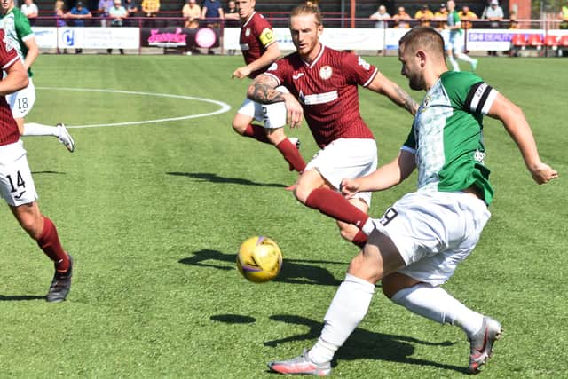 Fife striker Ryan Wallace whips in a cross during the side's 3-0 loss at Kelty on Saturday. Pic by Kenny Mackay