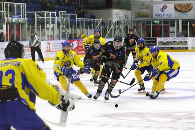 Tom Muir and Chris Wands in action for Kirkcaldy Kestrels at Dundee Ice Arena (Pic: Derek Black)