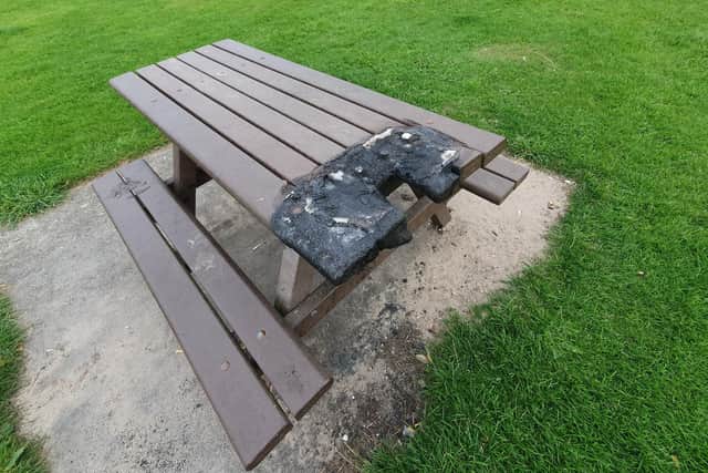 The picnic table at Seafield has been badly burned.