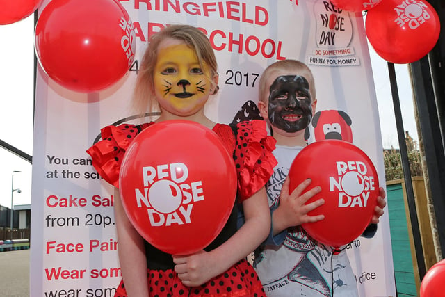 Baillie Mulholland (6) and nursery pupil Callum Baldie (4), from Springfield, at the school's fundraiser in 2017.