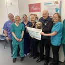 Frank and Ena Conyon from Second Chance Kennels and Alfie the dog along with the team from IVC, Tori, Rhona, Kirsteen, Rachel and Kerry. (Pic: Submitted)