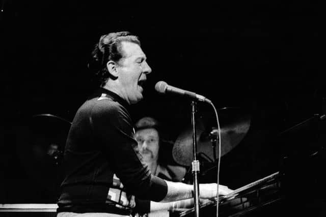28th February 1977:  Rock 'n' Roll pianist Jerry Lee Lewis, The Killer, performs at the Rainbow in London.  (Pic: Graham Wood/Evening Standard/Getty Images)