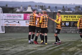 East Fife striker Alan Trouten is mobbed by his teammates after scoring the winner over Stenhousemuir (Pics by Kenny Mackay)
