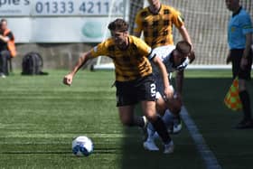 Stewart Murdoch gets the better of East Fife's Kevin O'Hara during Saturday's cup tie. Pic by Kenny Mackay