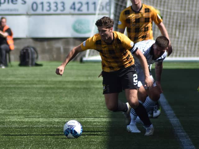 Stewart Murdoch gets the better of East Fife's Kevin O'Hara during Saturday's cup tie. Pic by Kenny Mackay