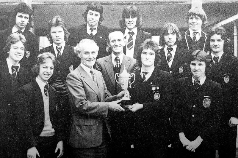 Kirkcaldy High School's first XI won the Fife School's U18 league for the second year in succession in 1978. 
Bob Adams, managing director of AH McIntosh, presented the McIntosh Trophy to the team's captain Peter Ross.