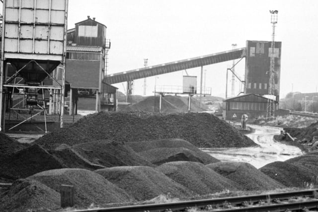 Seafield colliery in Fife, with piles of coal and dross by the railway line. Picture taken January 1988.