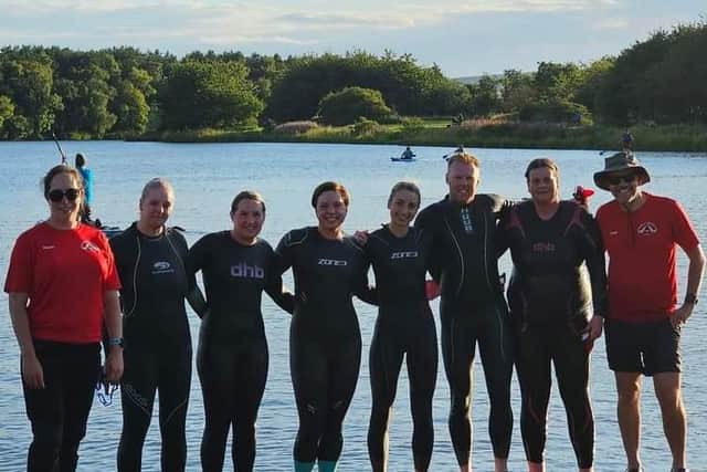 Isobel (fourth from right) and her fellow members at triathlon swimming stage