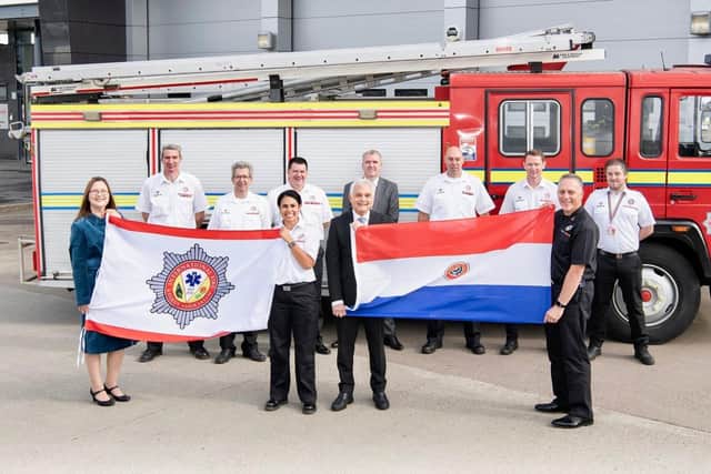 The Scottish Fire and Rescue Service donated the 100th fire appliance to the International Fire and Rescue Association, which was to be sent to Paraguay.
Pictured front, from left: Kirsty Derwent, chairperson of the SFRS board; Clara Kay; Mr Genaro Vicente Pappalardo, Paraguayan Ambassador and  Martin Blunden, chief fire officer SFRS.