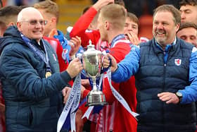 Raith Rovers boss John McGlynn and assistant Paul Smith with the SPFL Trust Trophy. (Pic: Fife Photo Agency)