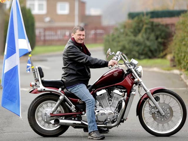 Roy Mackie on his motorbike.