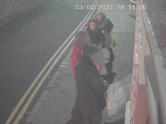 CCTV shows four individuals placing banners and posters on David Torrance MSP's office