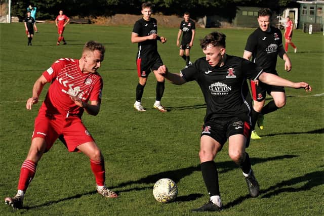 St Andrews United, in black, try to find a way through against Sauchie (picture by John Stevenson)