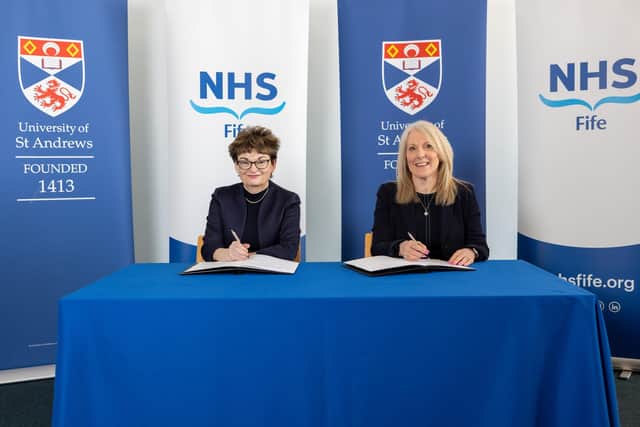 Professor Dame Sally Mapstone FRSE, Principal and Vice-Chancellor, University of St Andrews (Left) and NHS Fife Chief Executive Carol Potter sign Memorandum of Understanding.