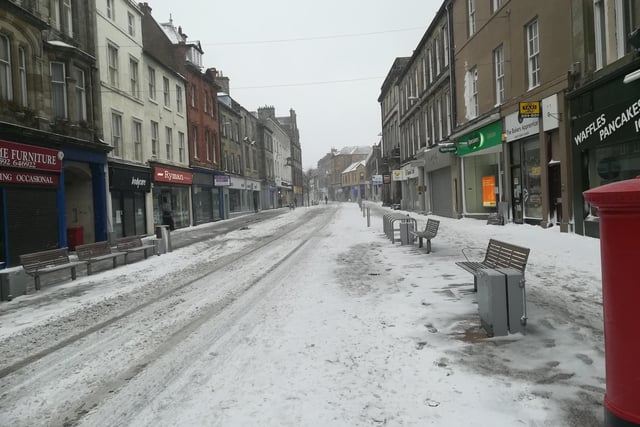 No shoppers to be scene as the High Street shivered under a heavy layer of snow