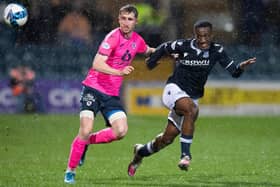 Raith Rovers' Ryan Nolan and Dundee's Zach Robinson vying for possession on Tuesday night (Photo by Mark Scates/SNS Group)