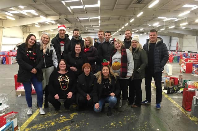Volunteers are being sought to help make sure the Kingdom’s most vulnerable children have a gift on December 25. The volunteers pictured are from Lloyds Banking Group who have worked with the charity every year.