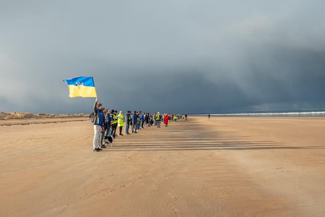 The Ukrainian flag was much in evidence as university staff and students were joined by the community of St Andrews on the West Sands.
