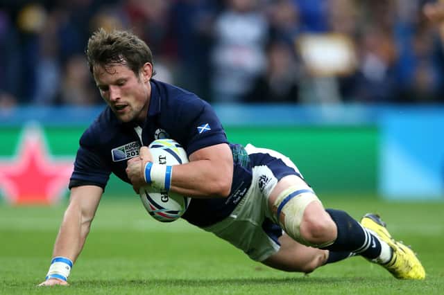 Peter Horne scores Scotland's first try during the 2015 Rugby World Cup quarter final match between Australia and Scotland at Twickenham Stadium. Photo by David Rogers/Getty Images